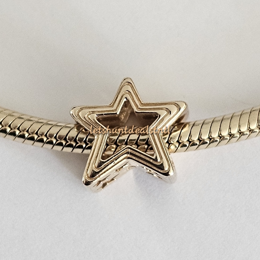 Pandora 14k Radiant Star Charm. 752361C00